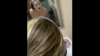 Long-haired girl gets doggy styled in a public restroom